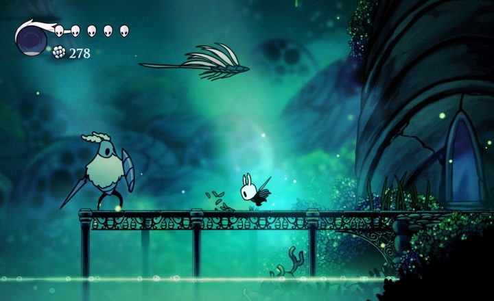 Hollow Knight gameplay inside a richly layered underground area